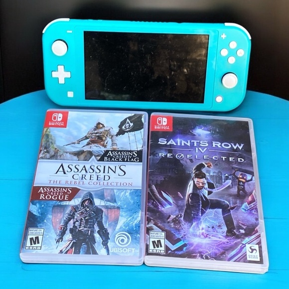 Nintendo Switch Lite Blue Bundle With 2 Games - Assassins Creed & Saints Row - Picture 1 of 7
